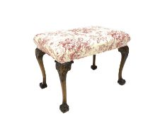 20th century Chippendale style walnut footstool, the top upholstered in red floral and ivory linen,