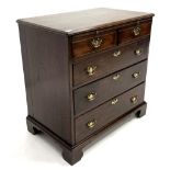 George III mahogany bachelors chest, moulded top over baize lined brushing slide, two short and thr