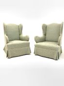 Pair of early 20th century wing back armchairs