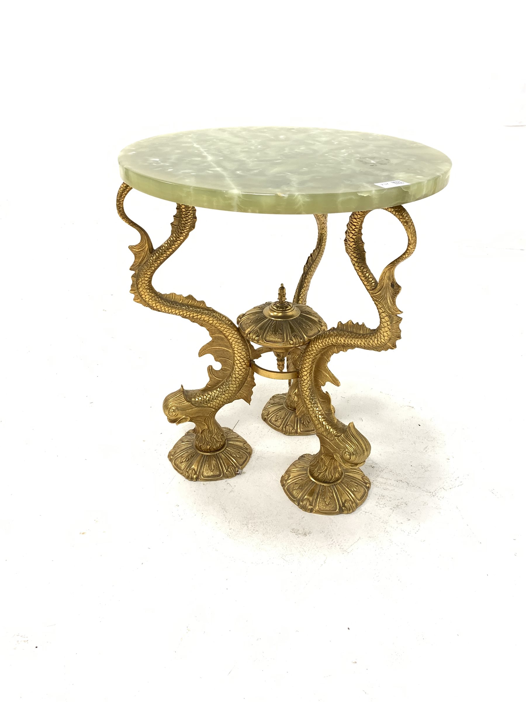 Brass and onyx circular table, cast base in the form of three mythical fish