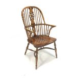 20th century elm Windsor chair, hoop and spindle back with carved splat centred by roundel, shaped a