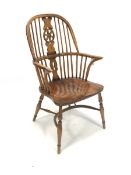 20th century elm Windsor chair, hoop and spindle back with carved splat centred by roundel, shaped a