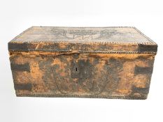 Charles II leather covered trunk, brass studded and bearing a coat of arms, possibly for the Duke of