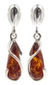 Pair of silver amber pendant stud earrings