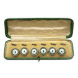 Set of six silver and gilt green paste and enamel and mother of pearl shirt studs