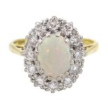 18ct gold oval opal and diamond cluster ring
