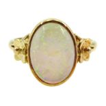 Gold single stone opal ring