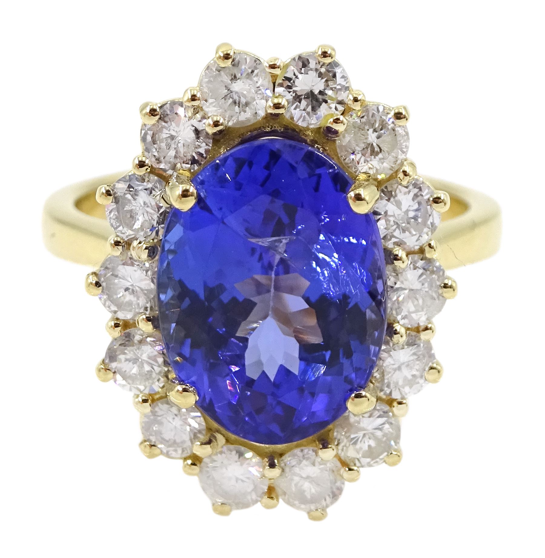 18ct gold oval tanzanite and round brilliant cut diamond cluster ring