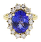 18ct gold oval tanzanite and round brilliant cut diamond cluster ring