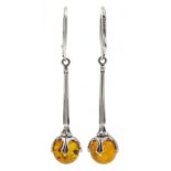 Pair of silver amber pendant earrings