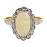 Gold oval opal and diamond