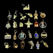 Twenty five 14ct gold charms including bus