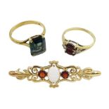 Gold opal and garnet bar brooch and two gold stone set rings