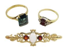 Gold opal and garnet bar brooch and two gold stone set rings