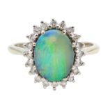 18ct white gold boulder opal and diamond cluster ring