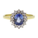 18ct gold oval sapphire and diamond cluster ring