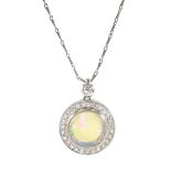 18ct white gold opal and diamond circular pendant
