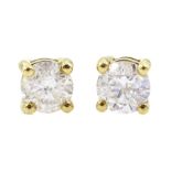 Pair of 18ct gold round brilliant cut diamond stud earrings