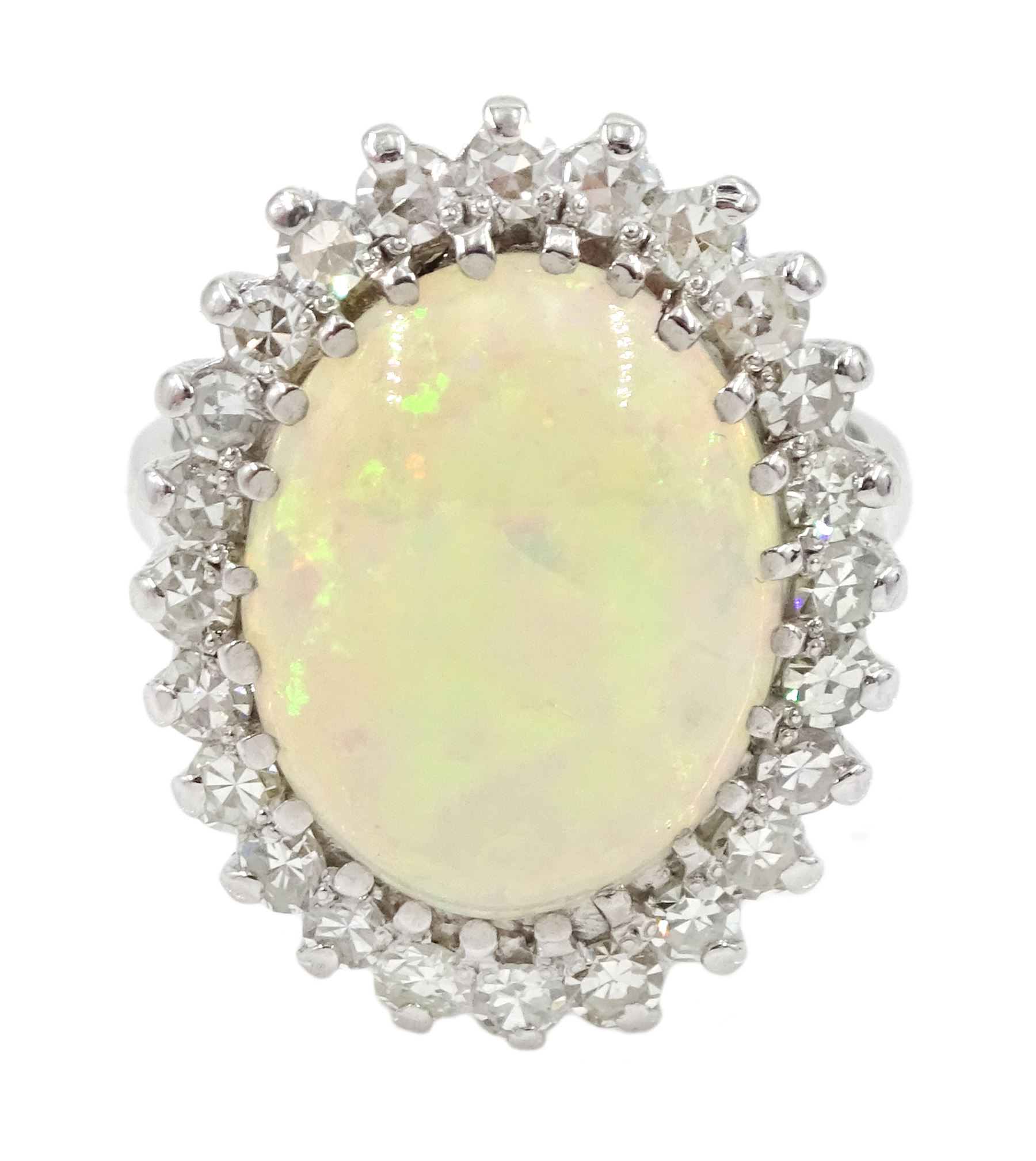 White gold oval opal and diamond cluster ring