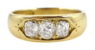 Gold three stone old cut diamond ring