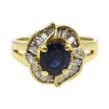 Gold oval sapphire and vari-cut diamond cluster ring