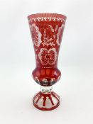 20th Century Bohemian ruby glass vase with etched decoration on a pedestal foot H40cm