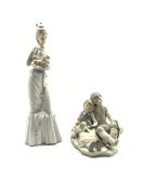 Lladro figure 'Walk with the Dog' No. 4893 and another of two children with a puppy