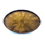 Edwardian walnut oval two handled tray composed of radiating veneers within a raised border L65cm