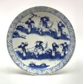 Late 19th/20th Century Chinese charger decorated with huntsmen in blue and white D30cm with characte