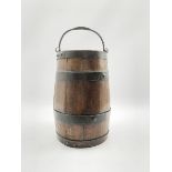 19th Century coopered oak barrel with wrought iron swing handle H34cm