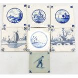 Group of assorted Delft tiles to include a set of three painted in roundels with buildings and lands