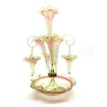 Victorian pink and green glass epergne with four trumpet shape vases and three suspended baskets wit