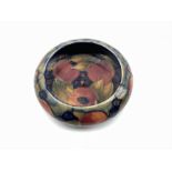 Moorcroft Pomegranate pattern bowl of compressed circular form