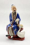 20th century Chinese ceramic group depicting a seated Scholar