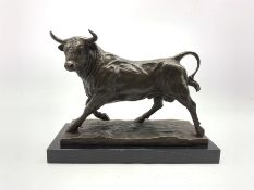 Large bronze model of a Bull