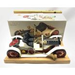 Mamod steam roadster with cream and chrome livery and red spoke wheels in original box