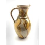 William Illsley (b1948) - Stamford pottery jug decorated in yellow and green on a speckled ground an