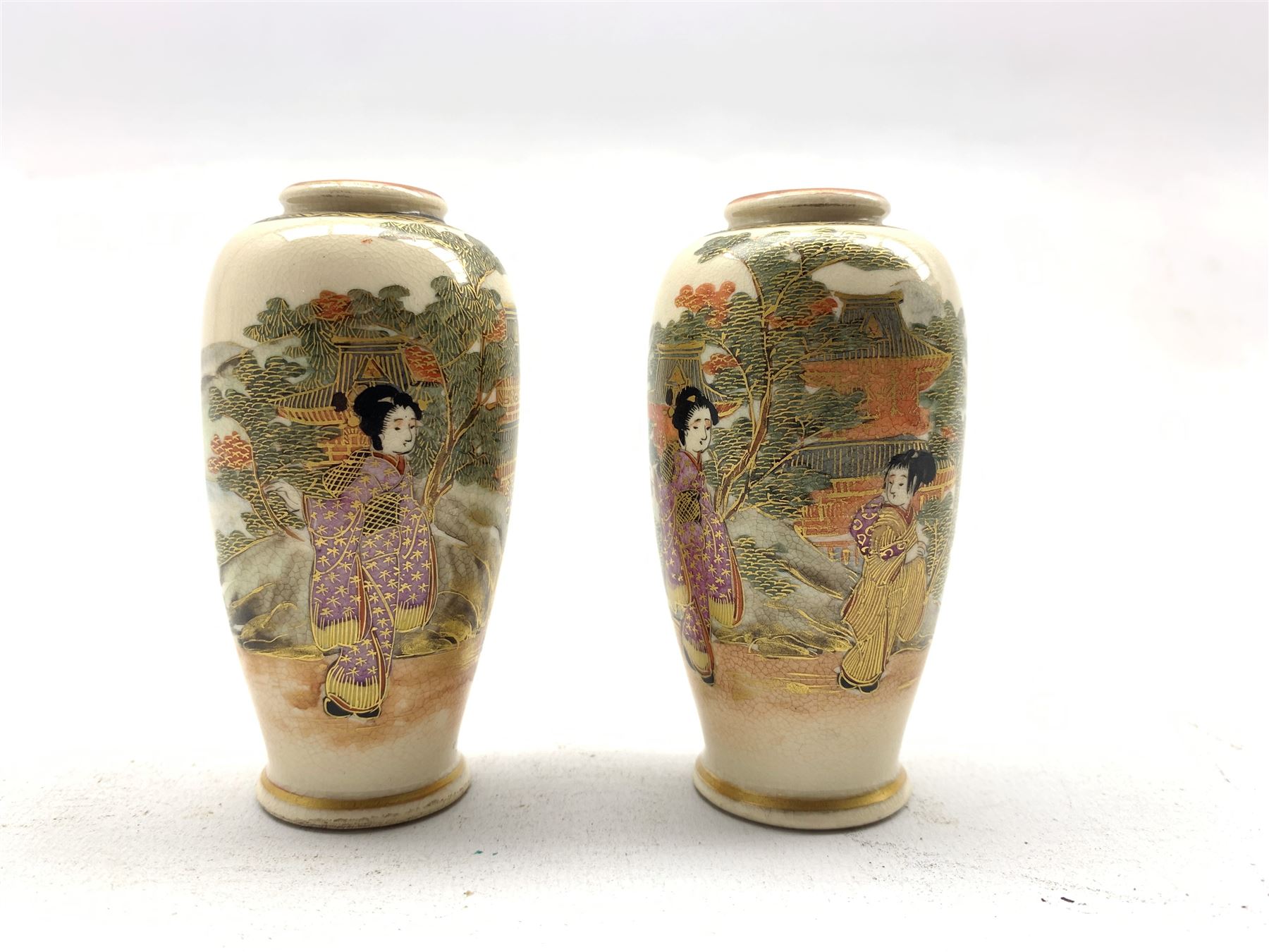 Pair of small Japanese Satsuma vases decorated with figures and landscapes H9cm