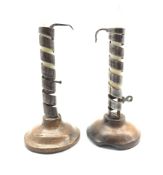 Pair of 18th Century iron spiral twist ejector candlesticks on wooden bases H20cm