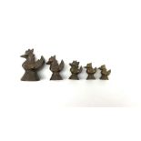 Set of five Burmese bronze graduated opium weights in the form of ducks Largest H4cm