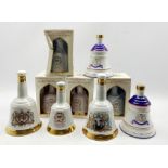 Four Wade Bell's whisky royal commemorative decanters