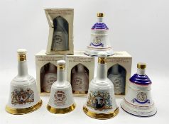 Four Wade Bell's whisky royal commemorative decanters