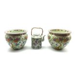 Pair of 20th Century Chinese jardinieres decorated with flowering shrubs and with seal mark to base