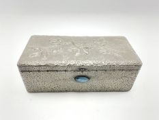 Arts and Crafts design pewter rectangular box decorated with a raised pattern of leaves and inset wi