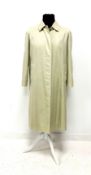 Burberry ladies beige coloured trench coat with check lining