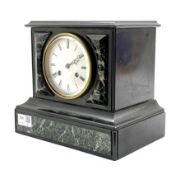 19th century black slate and variegated marble mantel clock. white enamel dial with Roman chapter ri