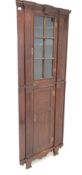 19th century architectural stained pine floor standing corner cupboard