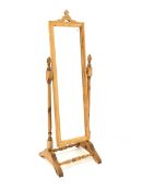 Solid pine cheval dressing mirror raised on turned uprights and sledge supports H142cm