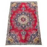 Persian design red ground carpet