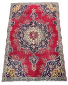 Persian design red ground carpet